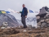 Leaving a silk scarf on the climbers monument at the base of the Khumbu Glacier